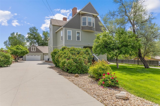 7996 Bradburn Blvd, Westminster, CO 80030 - view of home's exterior with a chimney and a garage