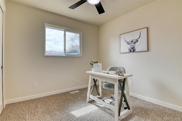 home office featuring visible vents, carpet, baseboards, and ceiling fan