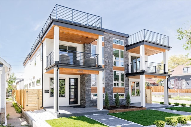 modern home featuring a balcony