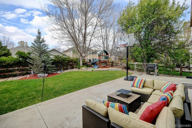 17613 E Peakview Ave, Aurora, CO 80016 - view of patio / terrace with an outdoor hangout area, a playground, and fence