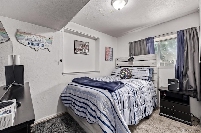 4416 E 93rd Pl, Thornton, CO 80229 - bedroom with a textured ceiling, carpet floors, and a textured wall