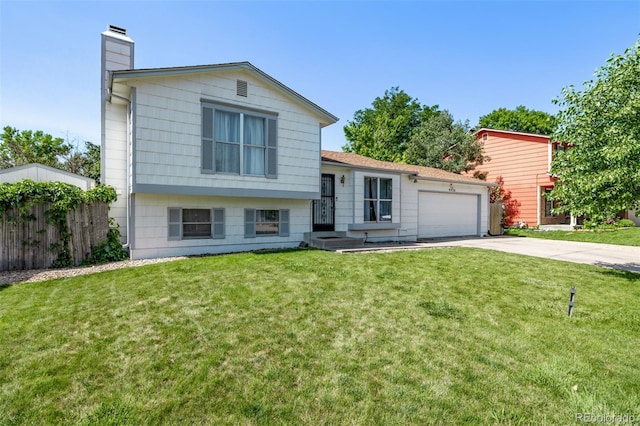 4416 E 93rd Pl, Thornton, CO 80229 - tri-level home featuring a chimney, driveway, and a garage