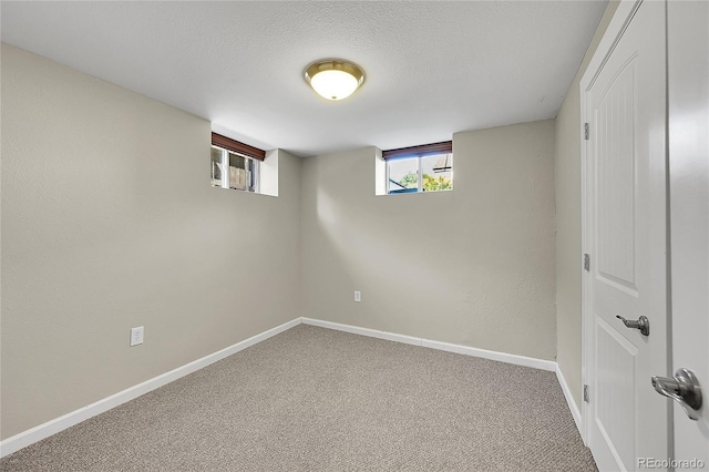 4268 S Delaware St, Englewood, CO 80110 - below grade area with carpet and a textured ceiling