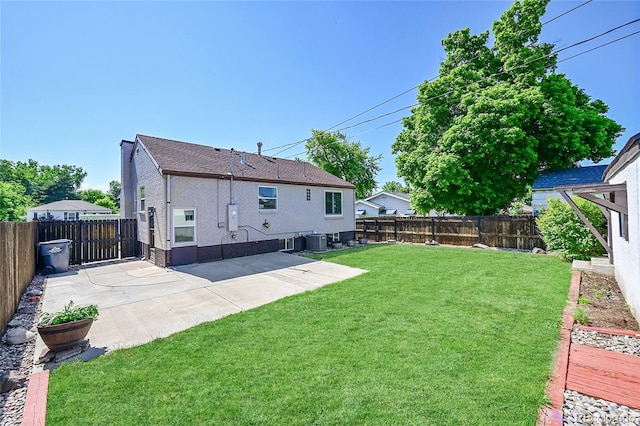 4268 S Delaware St, Englewood, CO 80110 - back of house featuring a patio area, a fenced backyard, and roof with shingles