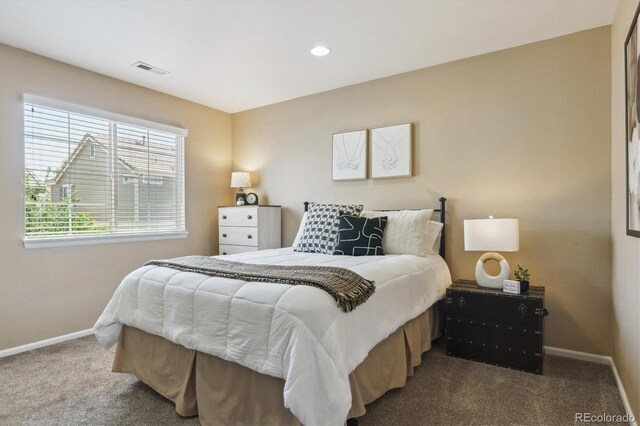 7342 S Mobile St, Aurora, CO 80016 - carpeted bedroom with baseboards and recessed lighting