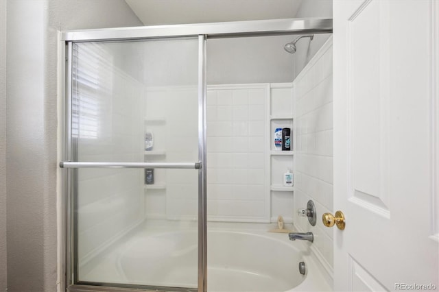 7342 S Mobile St, Aurora, CO 80016 - full bathroom with combined bath / shower with glass door and a textured wall
