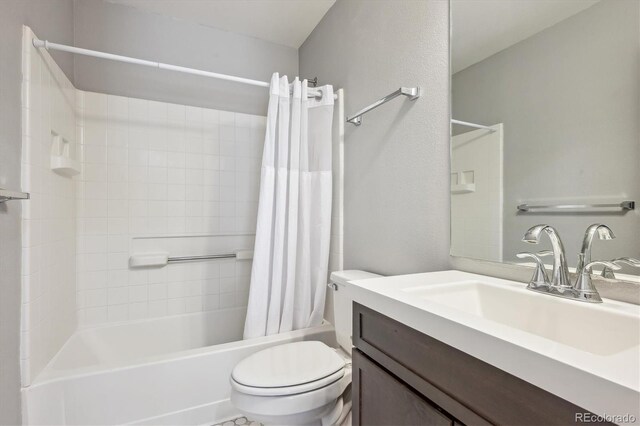 7342 S Mobile St, Aurora, CO 80016 - bathroom featuring shower / bath combination with curtain, toilet, and vanity