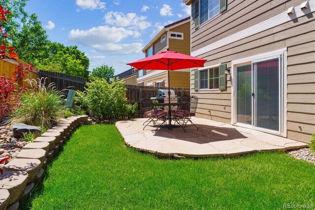 7342 S Mobile St, Aurora, CO 80016 - view of yard featuring a patio area