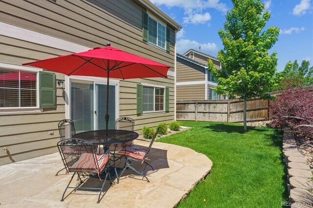 7342 S Mobile St, Aurora, CO 80016 - view of patio / terrace featuring outdoor dining space