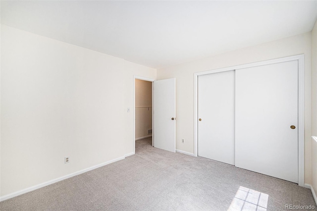 1756 S Quintero Way, Aurora, CO 80017 - unfurnished bedroom with light colored carpet and a closet