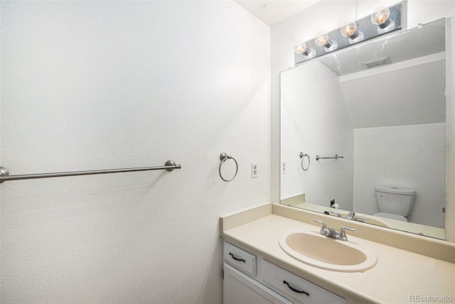 1756 S Quintero Way, Aurora, CO 80017 - bathroom with vanity and toilet