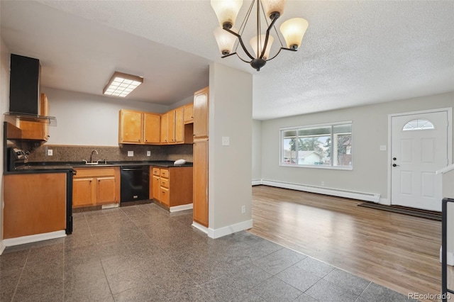 kitchen with extractor fan, pendant lighting, dishwasher, a baseboard radiator, and backsplash