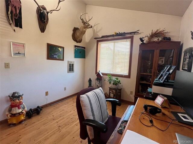 304 Cowan Rd, Bailey, CO 80421 - office with light wood-style floors, vaulted ceiling, and baseboards