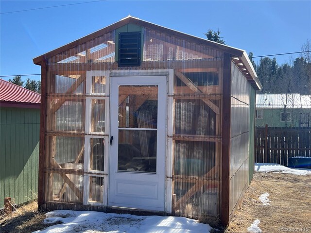 304 Cowan Rd, Bailey, CO 80421 - snow covered structure featuring a greenhouse