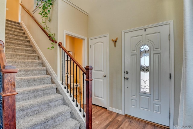 3470 Daydreamer Dr, Colorado Springs, CO 80908 - foyer featuring wood finished floors and stairs