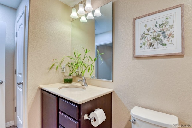 3470 Daydreamer Dr, Colorado Springs, CO 80908 - half bath with vanity and a chandelier
