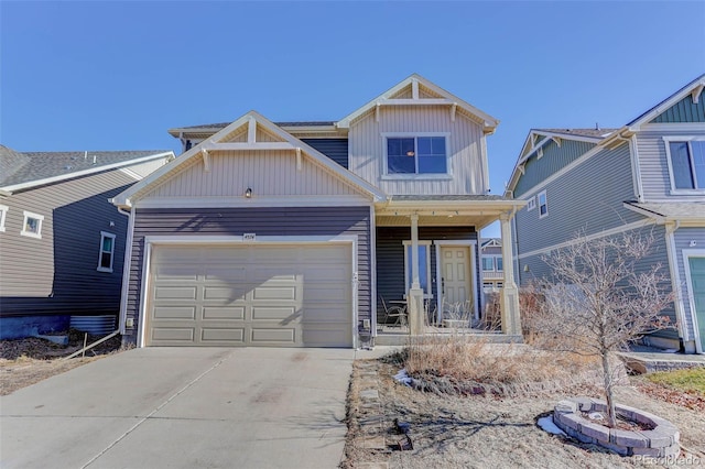 view of front of property featuring a garage and a porch