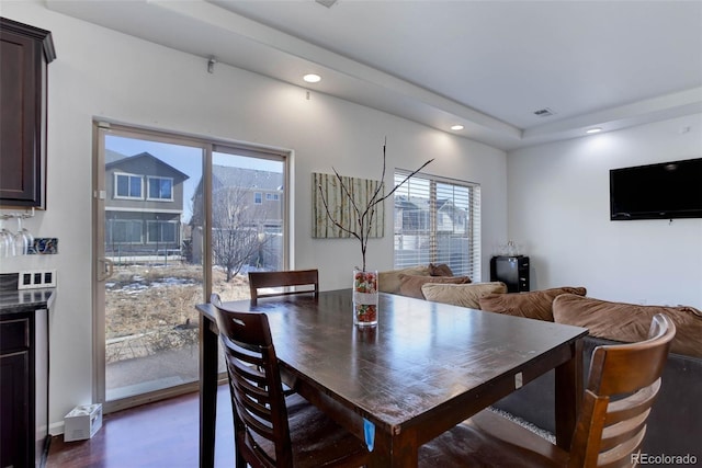 dining area featuring dark hardwood / wood-style flooring