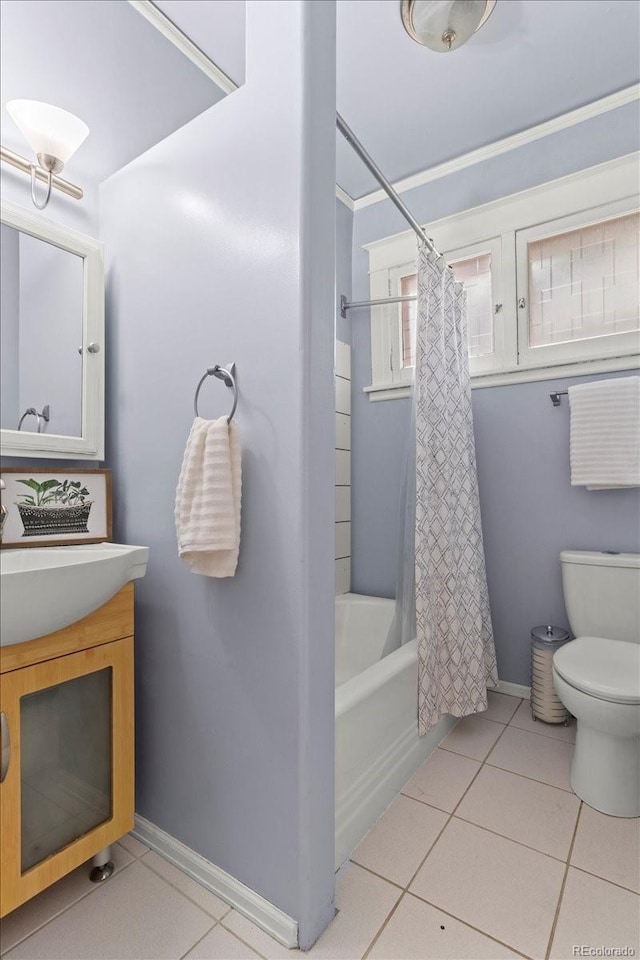 full bathroom featuring vanity, toilet, tile patterned flooring, and shower / bath combo