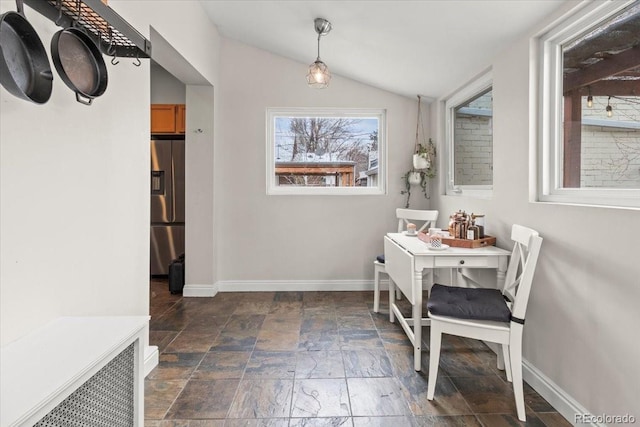 2377 Cherry St, Denver, CO 80207 - interior space featuring baseboards, stone finish flooring, and lofted ceiling