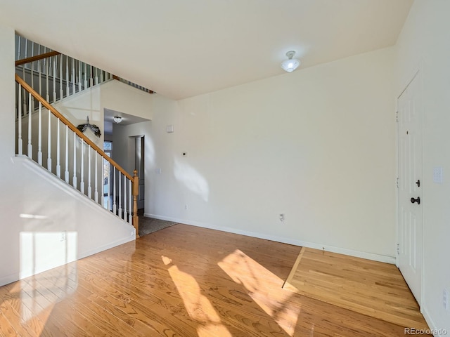 foyer entrance featuring hardwood / wood-style floors