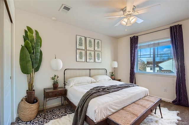 carpeted bedroom with ceiling fan