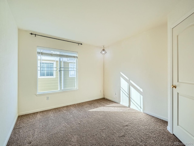 view of carpeted spare room