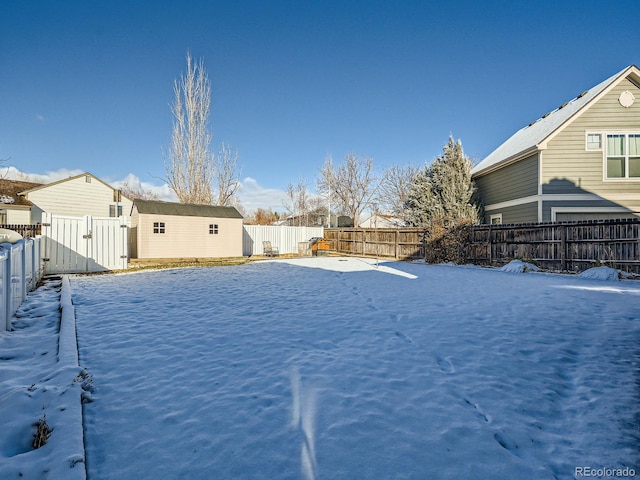 view of yard covered in snow