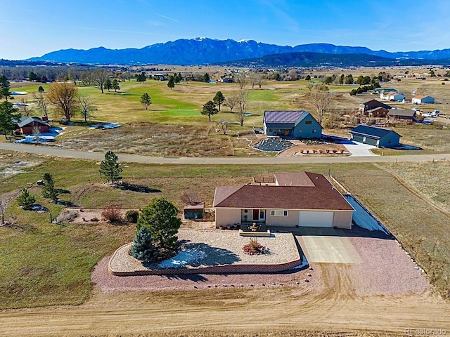 drone / aerial view featuring a mountain view