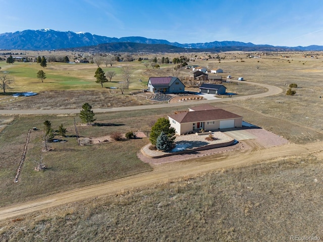 aerial view featuring a mountain view and a rural view