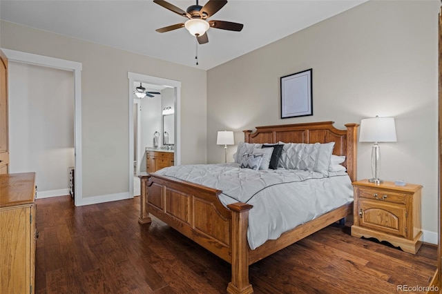bedroom with ceiling fan, ensuite bathroom, baseboards, and dark wood finished floors