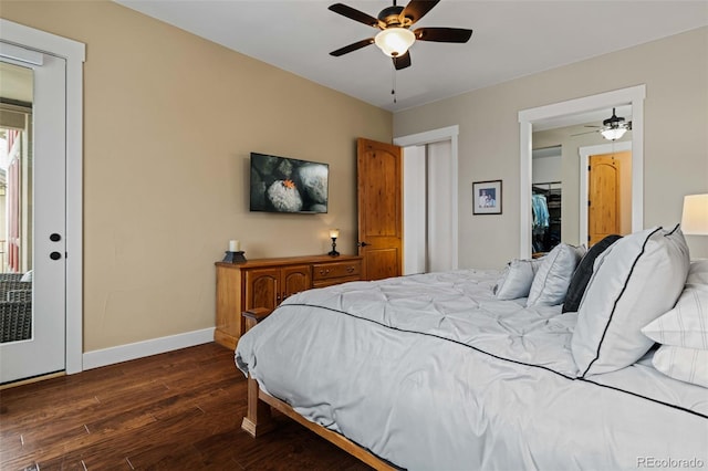 bedroom with baseboards, a ceiling fan, and dark wood finished floors