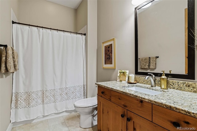 bathroom with tile patterned floors, toilet, vanity, and a shower with curtain