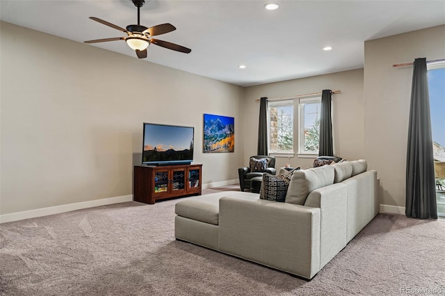 carpeted living room featuring ceiling fan, recessed lighting, and baseboards