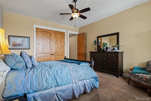 bedroom with baseboards, a ceiling fan, and light colored carpet