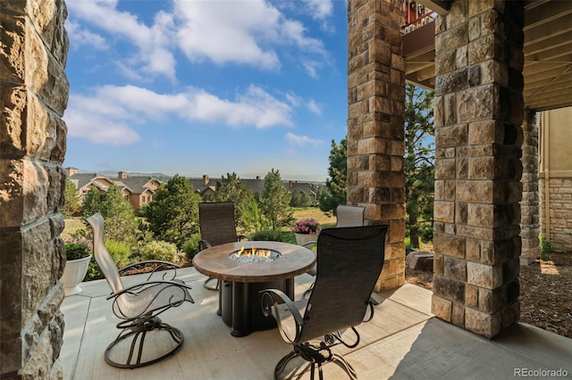 view of patio featuring a fire pit