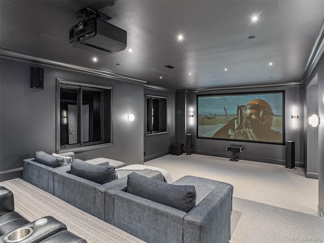 carpeted cinema with crown molding