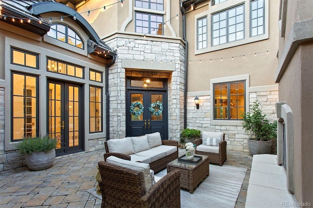 view of patio featuring outdoor lounge area and french doors