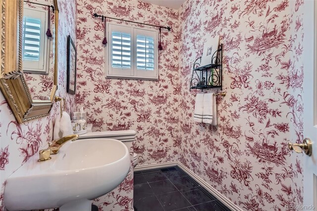 32 Silver Fox Cir, Greenwood Village, CO 80121 - bathroom with baseboards, tile patterned flooring, and a sink