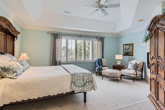 32 Silver Fox Cir, Greenwood Village, CO 80121 - bedroom with a tray ceiling, carpet floors, baseboards, a fireplace, and ornamental molding