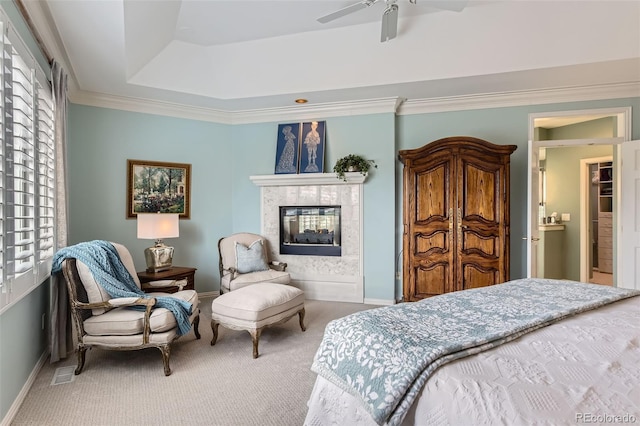 32 Silver Fox Cir, Greenwood Village, CO 80121 - bedroom featuring carpet, a tray ceiling, baseboards, crown molding, and a fireplace