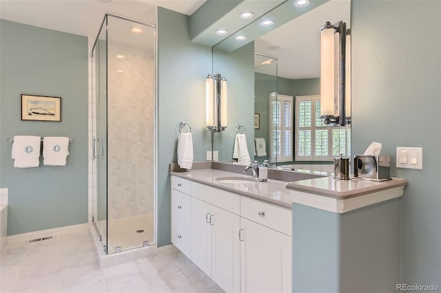 32 Silver Fox Cir, Greenwood Village, CO 80121 - full bath featuring vanity, a stall shower, recessed lighting, marble finish flooring, and a tub