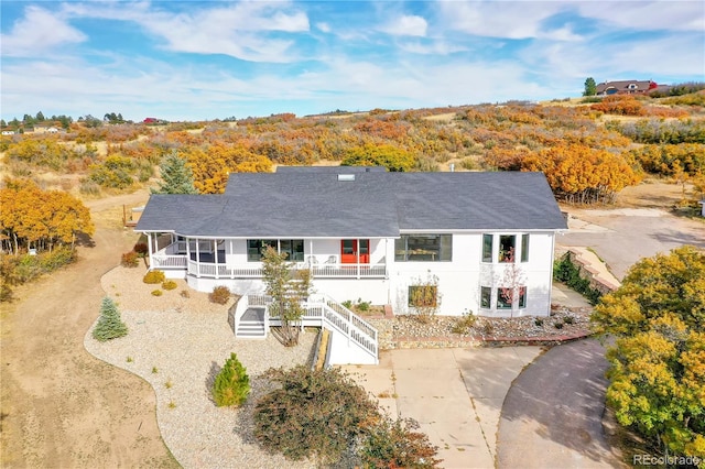 single story home with a porch