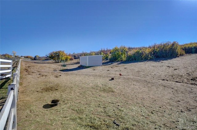 view of yard featuring a rural view