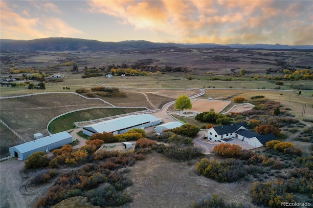 aerial view at dusk with a mountain view