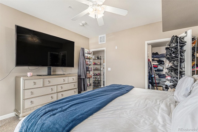 bedroom with visible vents, baseboards, ceiling fan, and carpet flooring