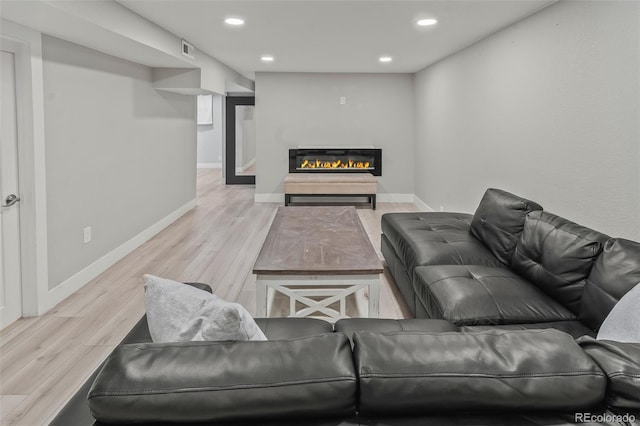 living room with light wood-type flooring