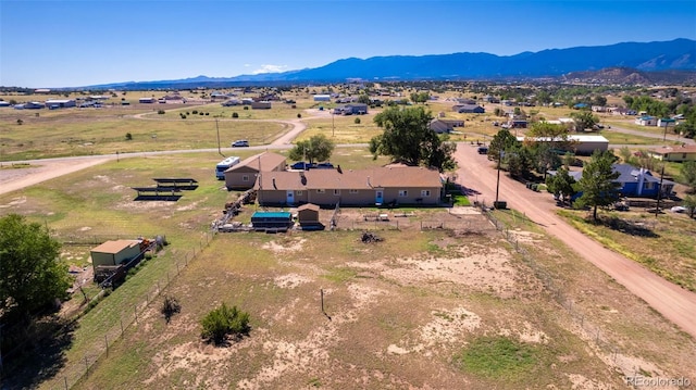 bird's eye view with a rural view and a mountain view