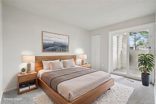 6705 S Field St Unit 803, Littleton, CO 80128 - bedroom with carpet floors and access to outside