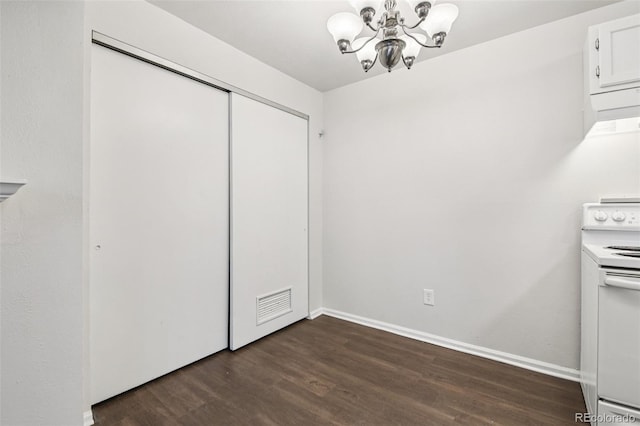 6705 S Field St Unit 803, Littleton, CO 80128 - unfurnished dining area featuring a chandelier and dark wood-style flooring